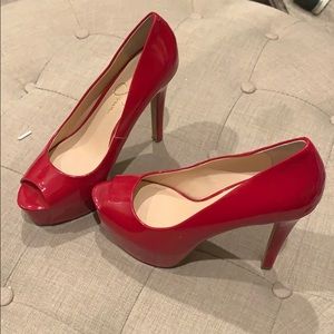 Jessica Simpson red pumps